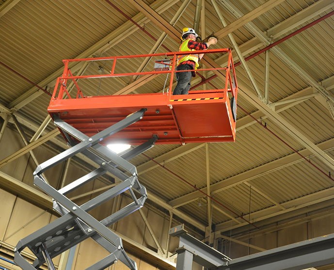 What are self-propelled scissor lifts used for?